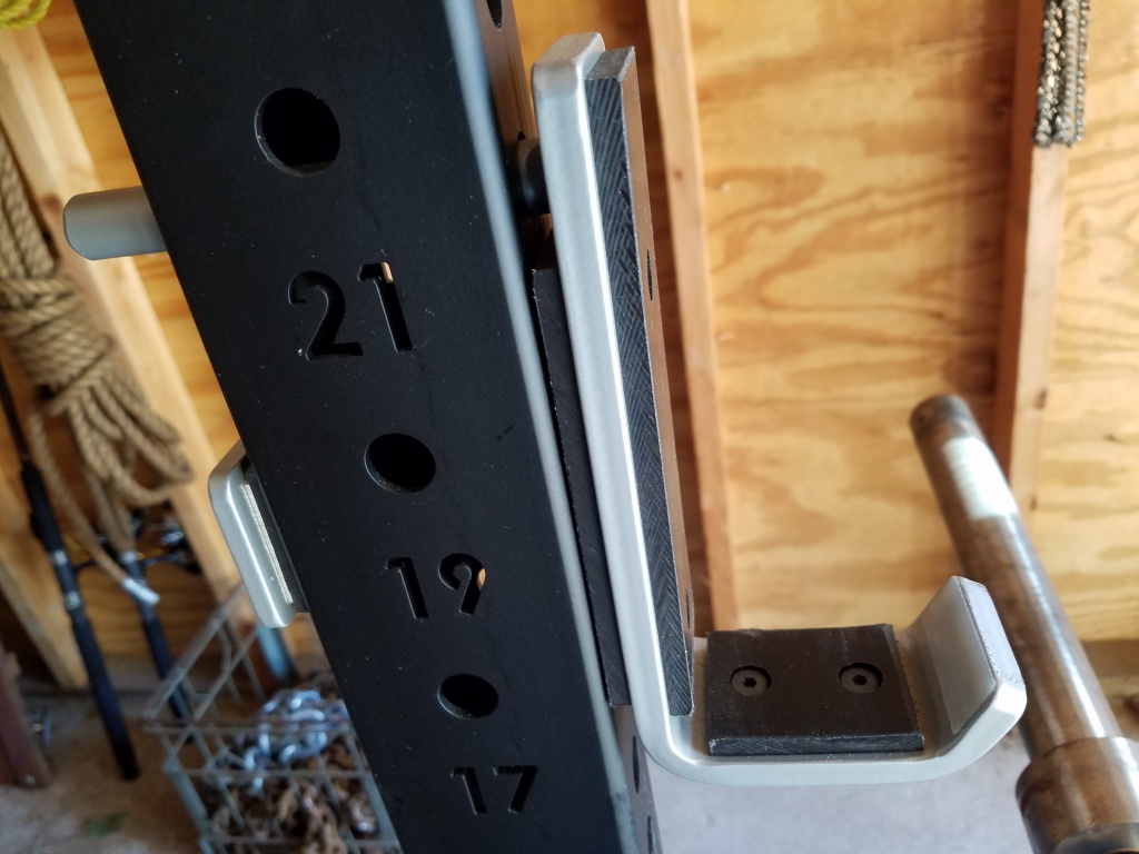 UHMW lined J-cups and laser cut numbers in uprights of power rack