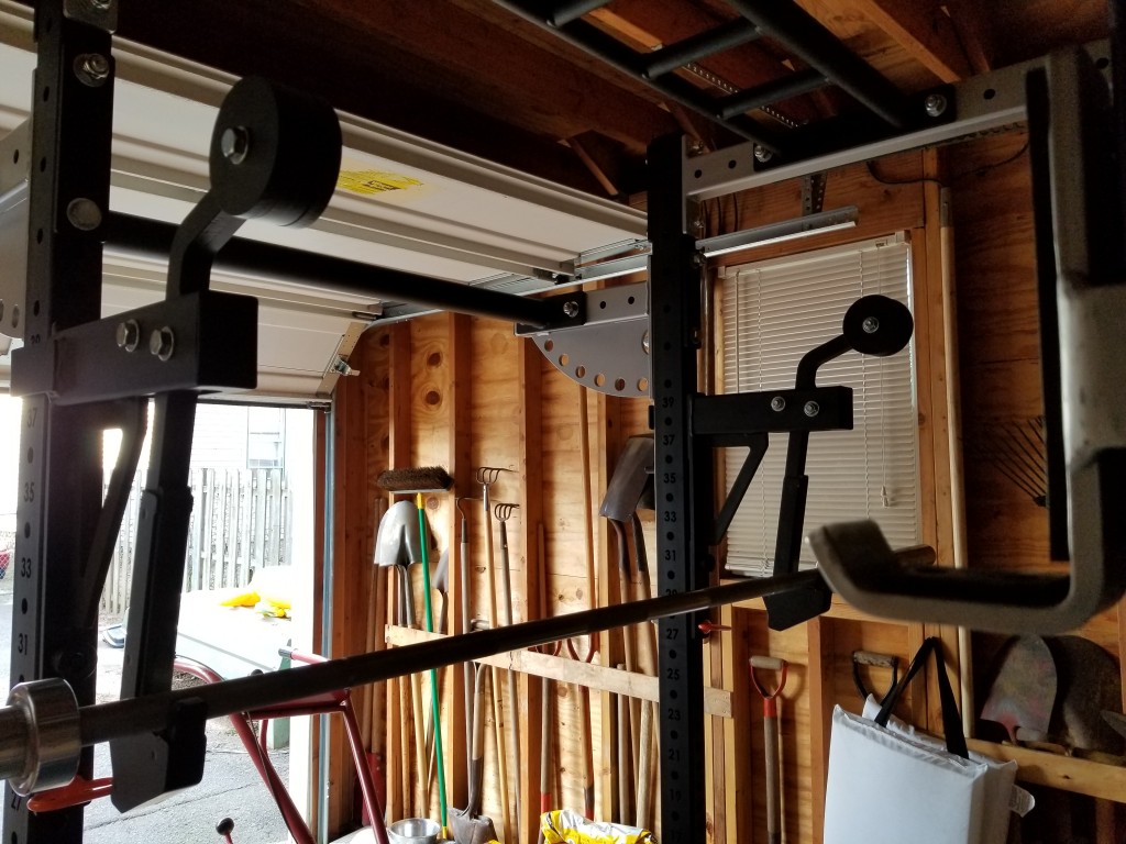 Monolift attachment with barbell hanging on it