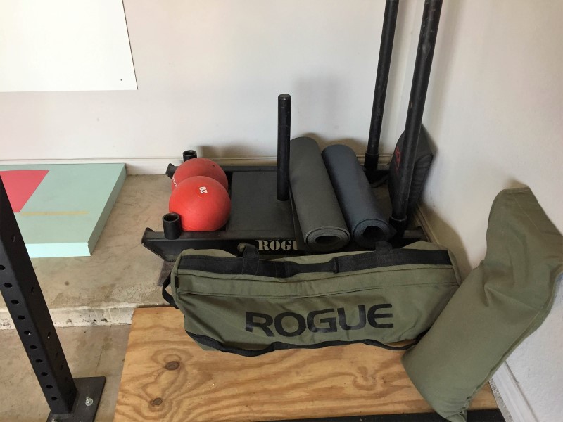 Dog Sled, Echo Slam Balls, yoga mats, and Sandbags