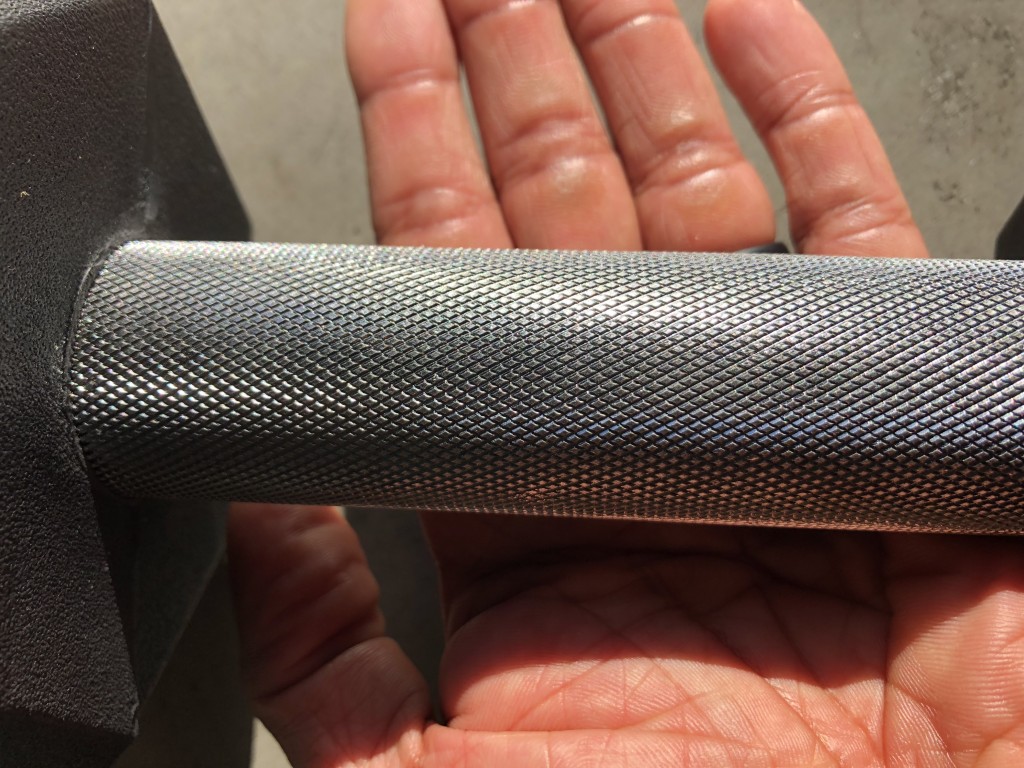 knurling of Rep rubber hex dumbbells