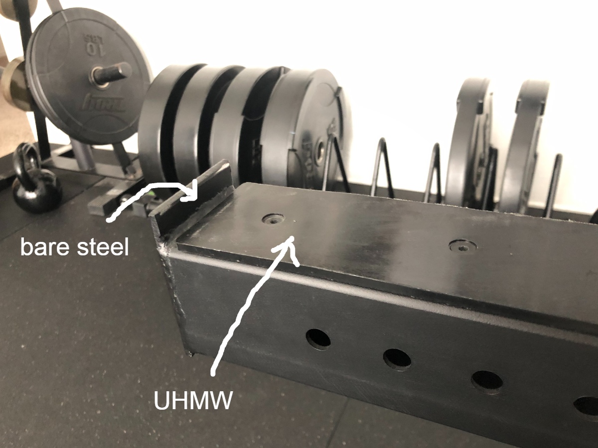 power rack safety arms with exposed steel lip