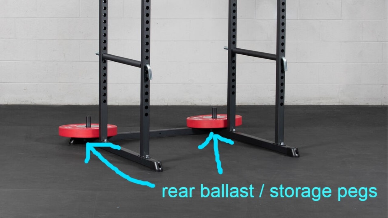 rear storage pegs on affordable power rack to weigh it down